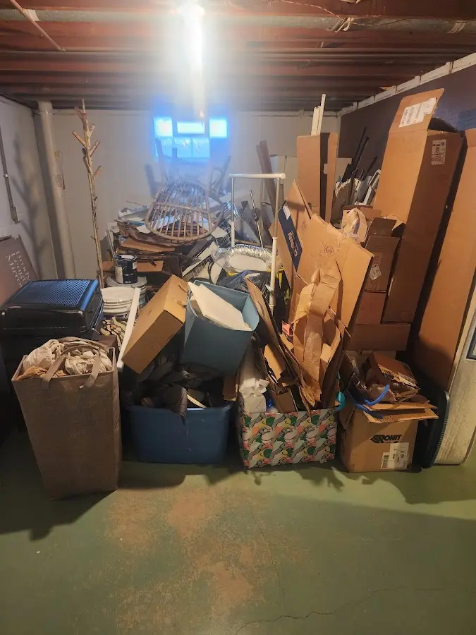 Roll-off dumpster container at job site for 15 Yard Dumpster Rental in Suwanee